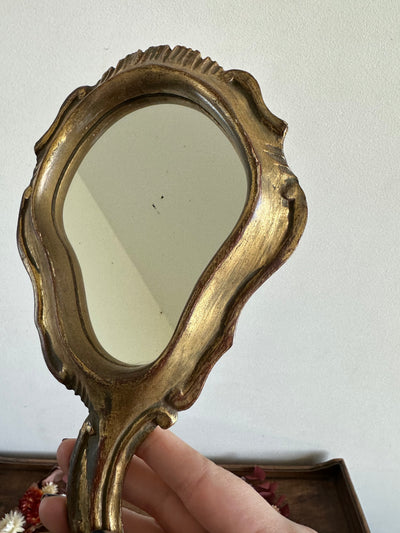Miroir à main florentin en résine dorée