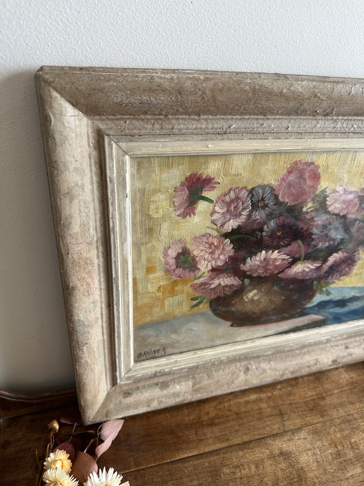 Peinture signée Gruner bouquet de fleurs mauves sur toile