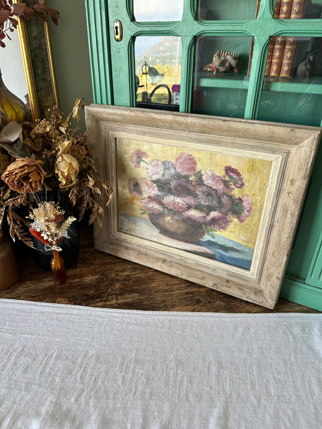 Peinture signée Gruner bouquet de fleurs mauves sur toile