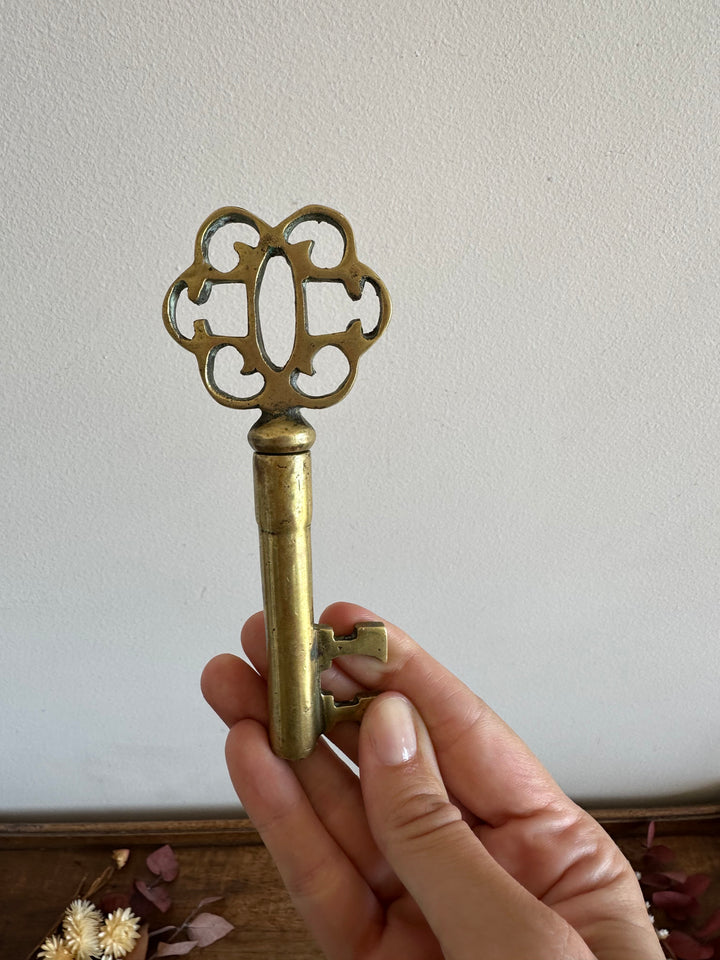 Clé tire-bouchon en bronze doré