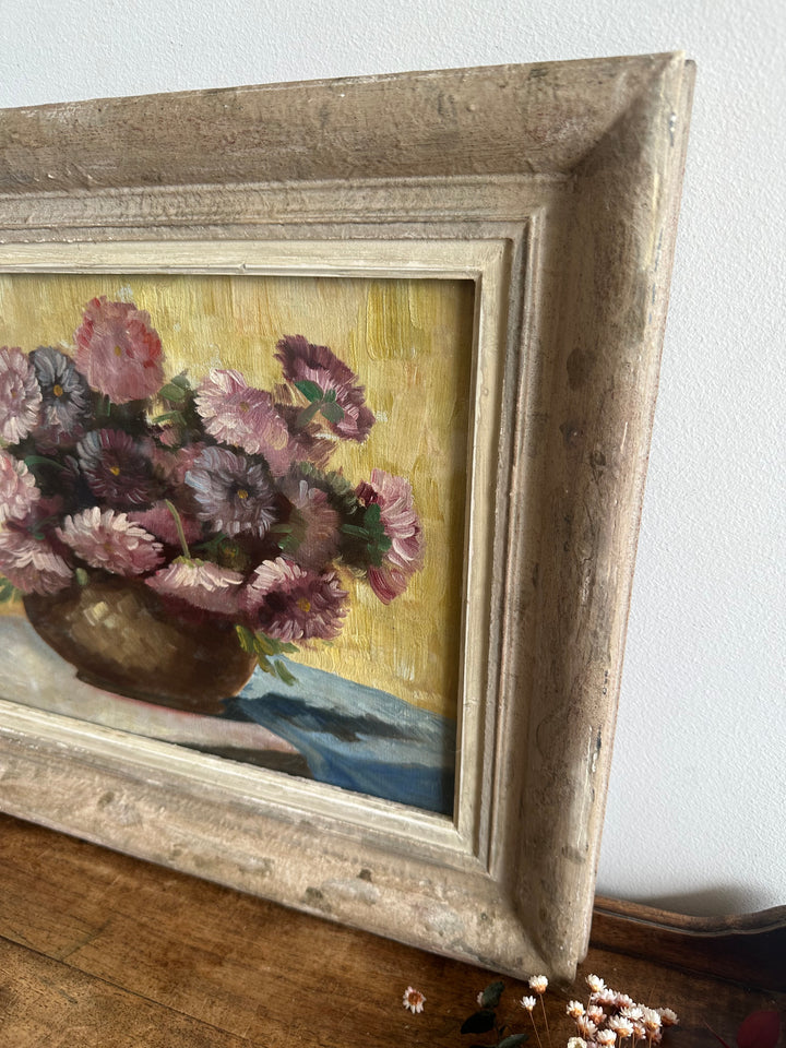 Peinture signée Gruner bouquet de fleurs mauves sur toile