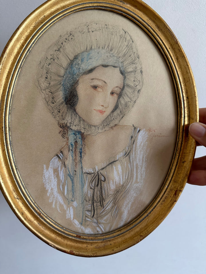 Dessin au fusain signé encadré bois doré ovale