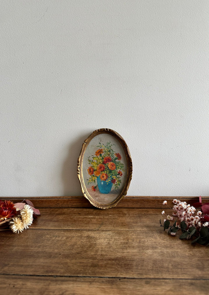 Peinture florale dans son médaillon en bois doré années 1900