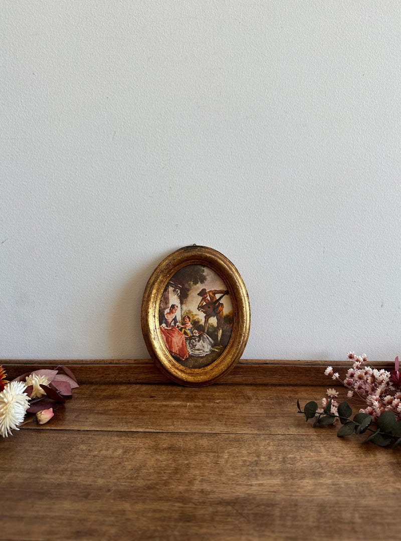 Impression sous verre scène romantique florentine dans cadre en bois doré