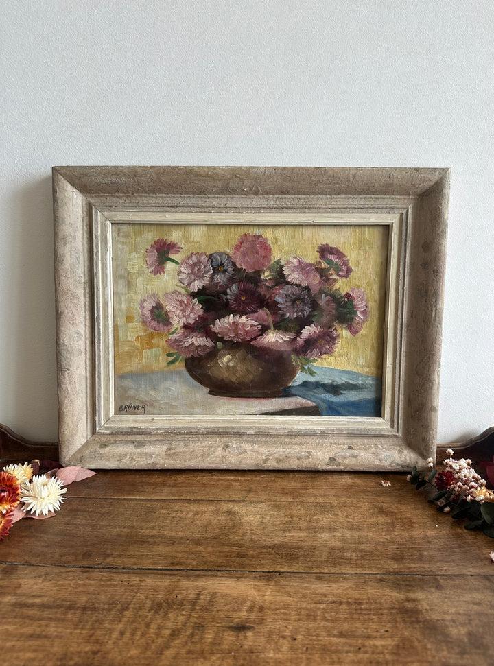 Peinture signée Gruner bouquet de fleurs mauves sur toile