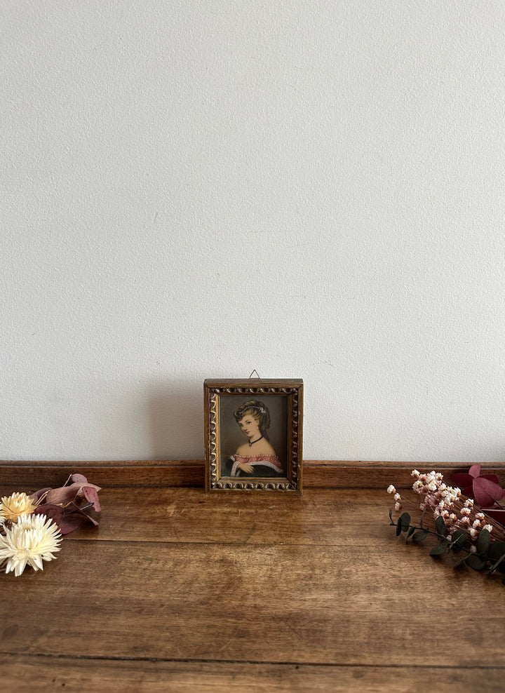 Impression portrait de jeune femme encadrement en bois doré