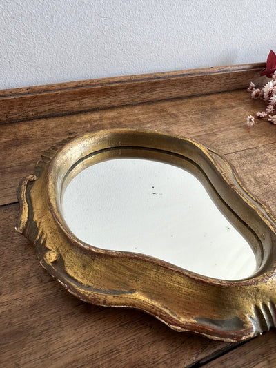 Miroir à main florentin en résine dorée