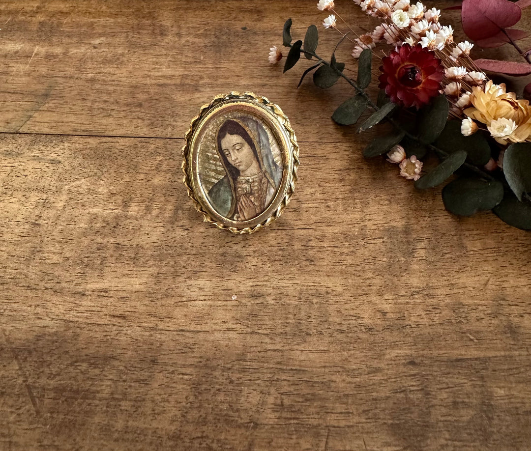 Médaillon à poser de la Vierge cerclé de métal doré