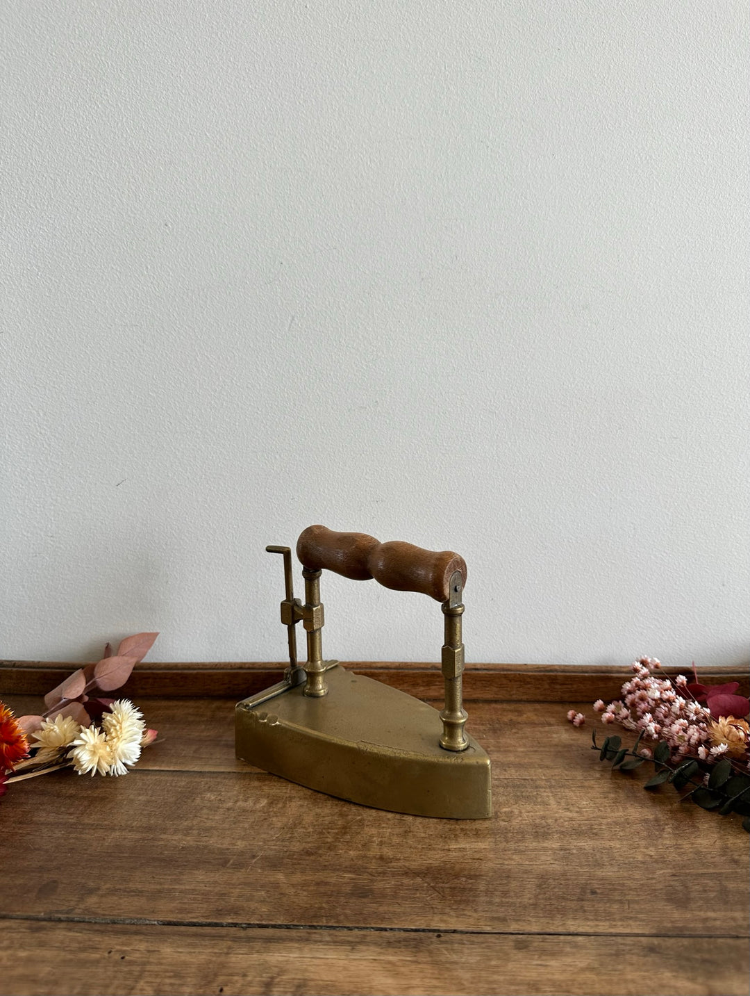 Fer en laiton et manche en bois