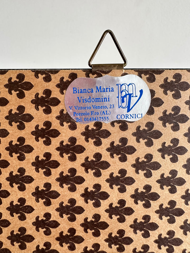 Broderie au point de croix dans cadre en bois bleu liseré doré
