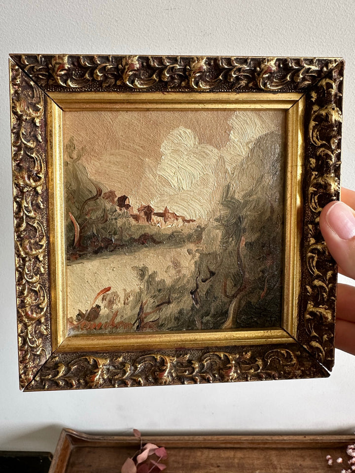 Peinture impressionniste village et rivière dans cadre en bois doré moulé