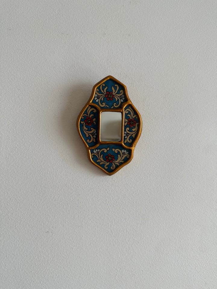 Miroir émaillé péruvien bleu et or
