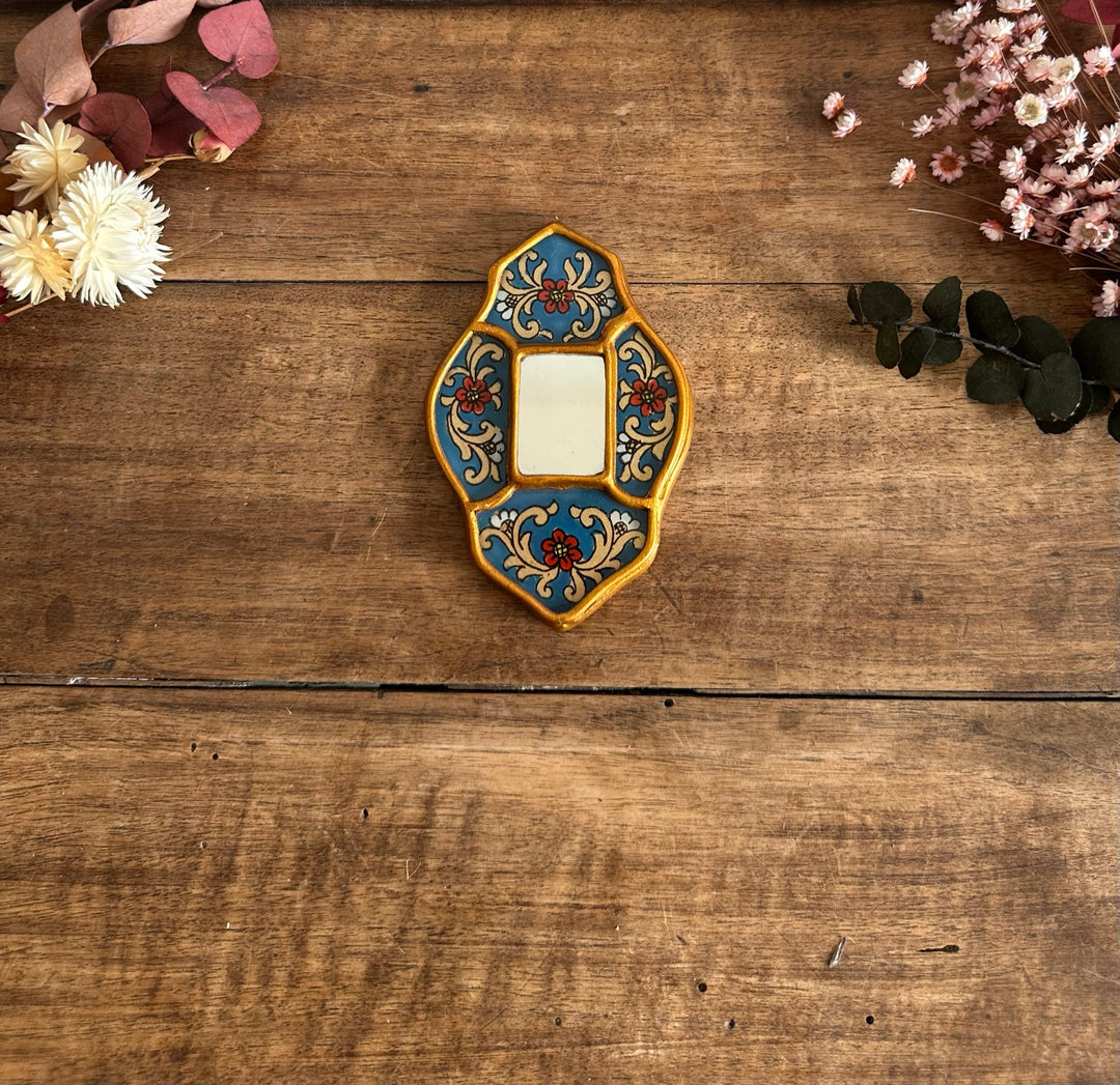 Miroir émaillé péruvien bleu et or
