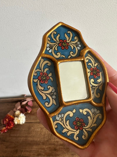Miroir émaillé péruvien bleu et or