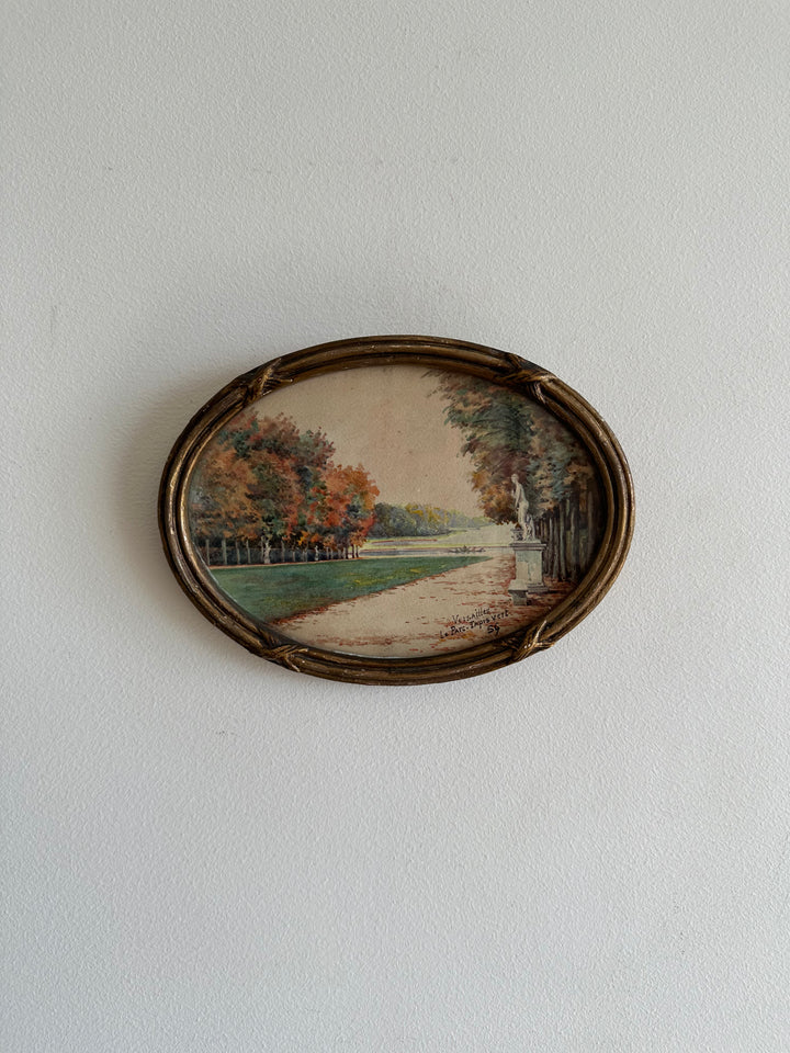 Peinture signée représentant le parc de versailles années 20