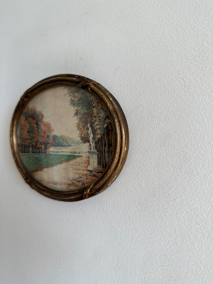 Peinture signée représentant le parc de versailles années 20