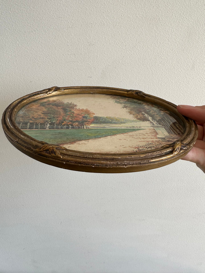 Peinture signée représentant le parc de versailles années 20