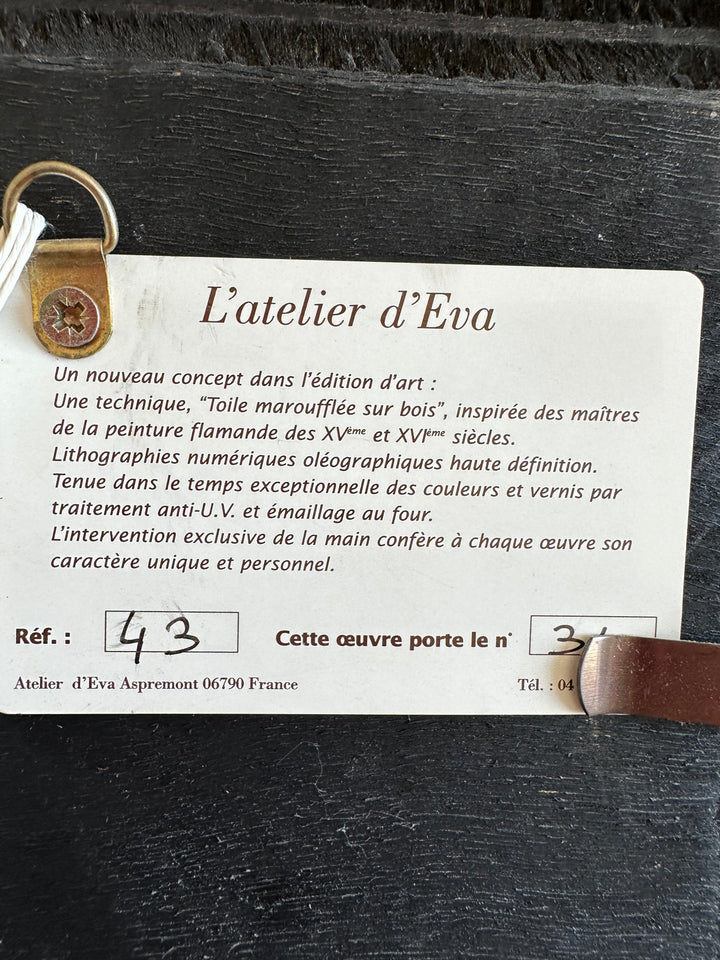 Toile marouflée sur bois représentant une rose dans son cadre épais doré