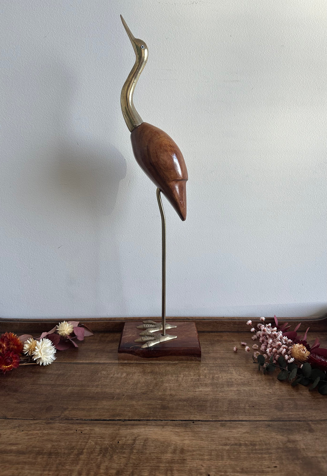 Héron en bois pied en laiton sur socle rectangulaire