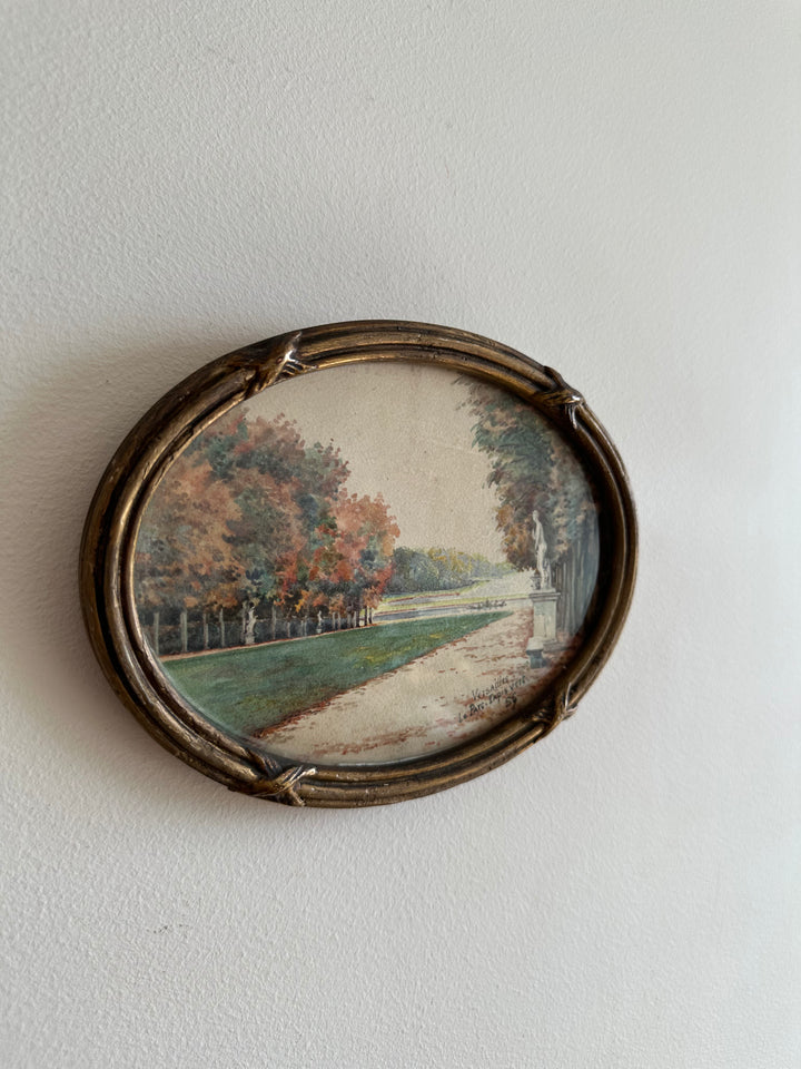 Peinture signée représentant le parc de versailles années 20
