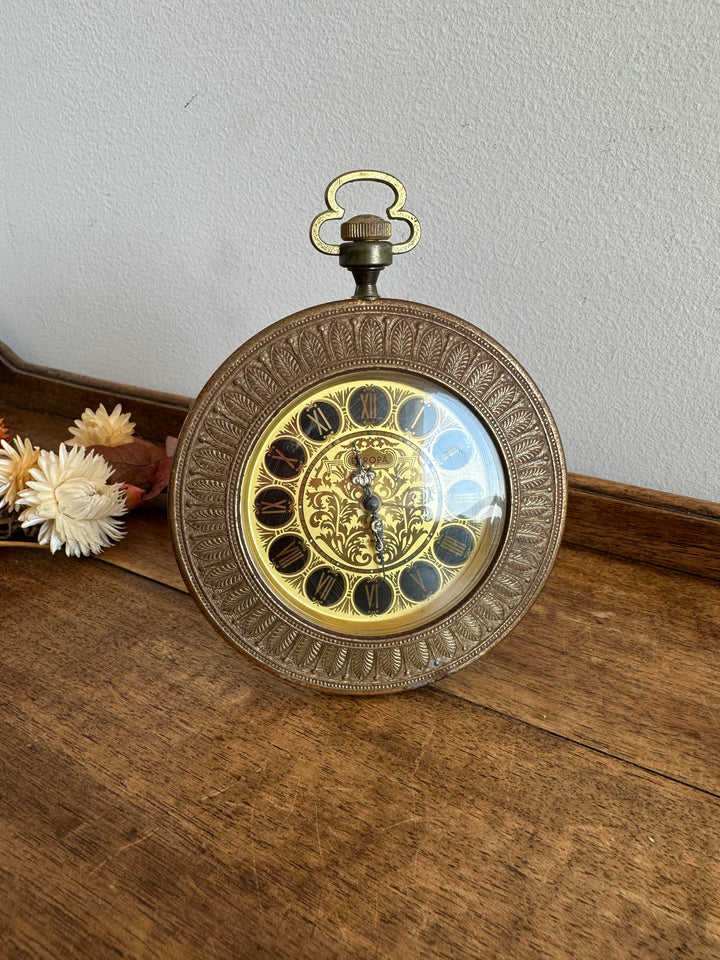 Réveil matin sur pied Europa en métal doré