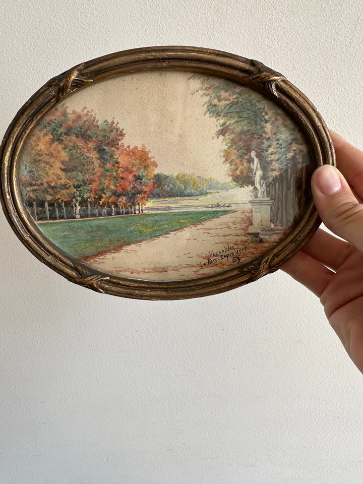 Peinture signée représentant le parc de versailles années 20