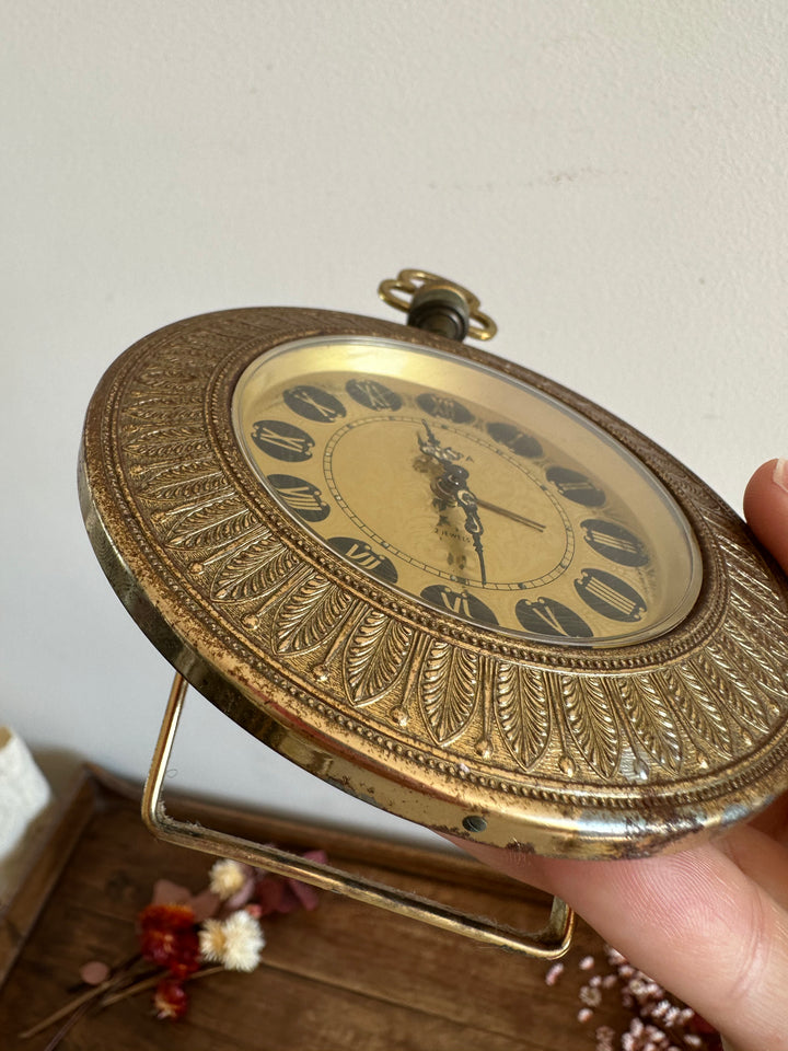 Réveil matin sur pied Europa en métal doré