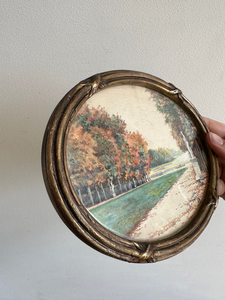 Peinture signée représentant le parc de versailles années 20