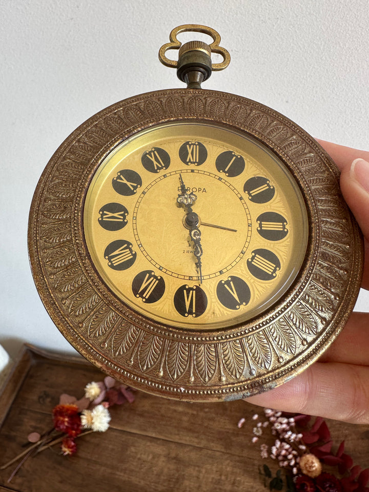 Réveil matin sur pied Europa en métal doré