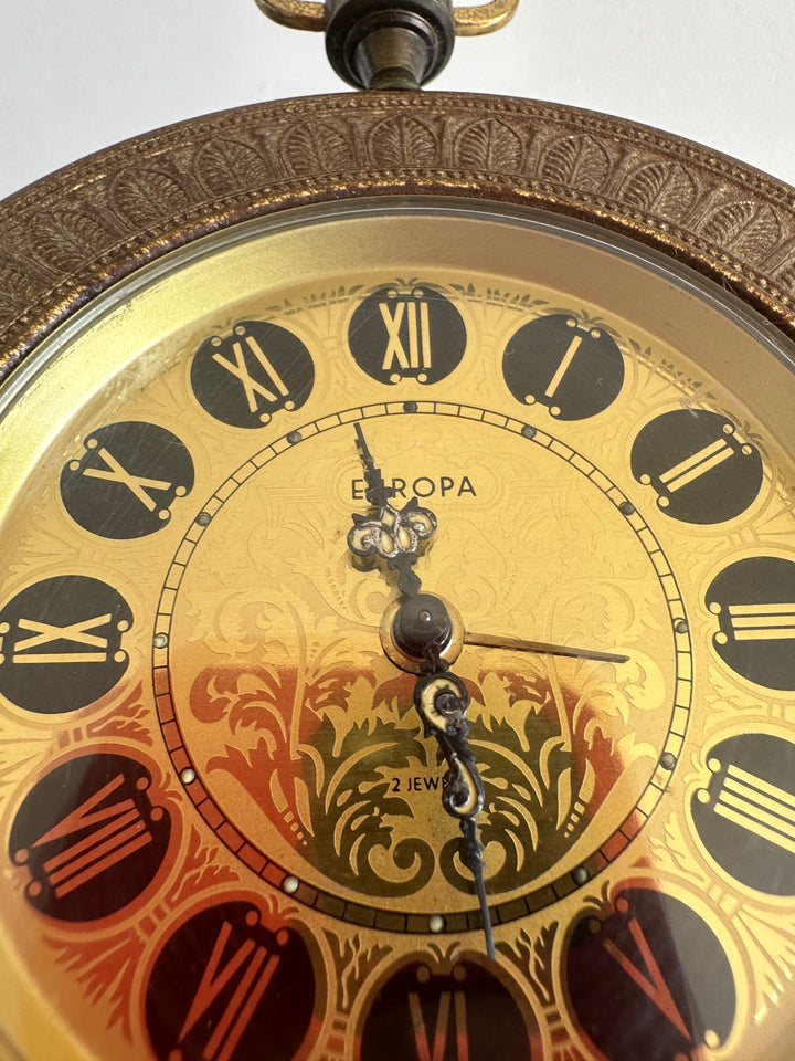 Réveil matin sur pied Europa en métal doré