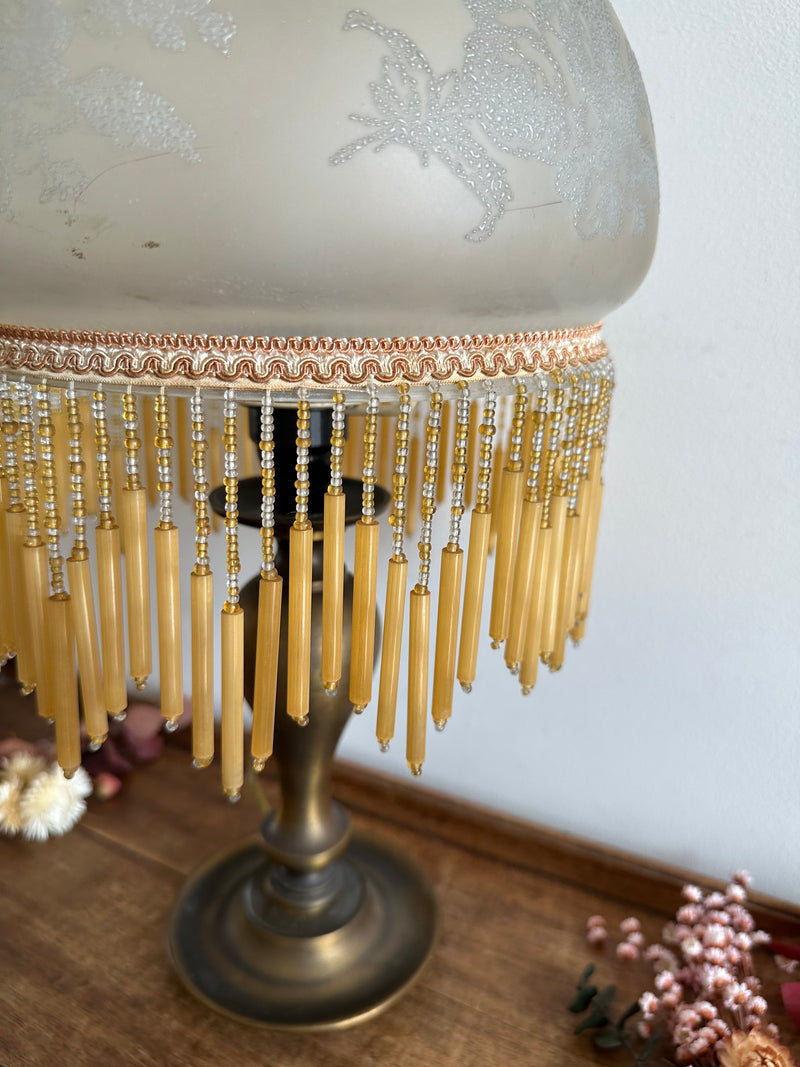 Lampe style charleston rideau de perle orangé