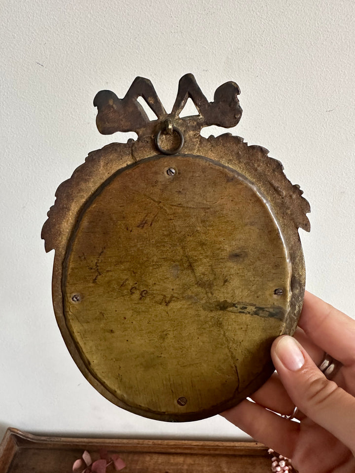 Cadre photo Napoléon III rond en bronze noeud sur fronton