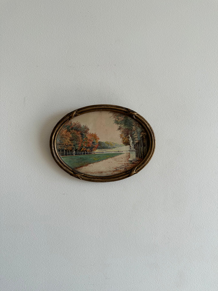 Peinture signée représentant le parc de versailles années 20