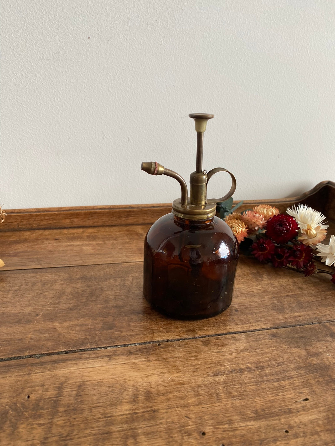 Vaporisateur en verre ambré et laiton