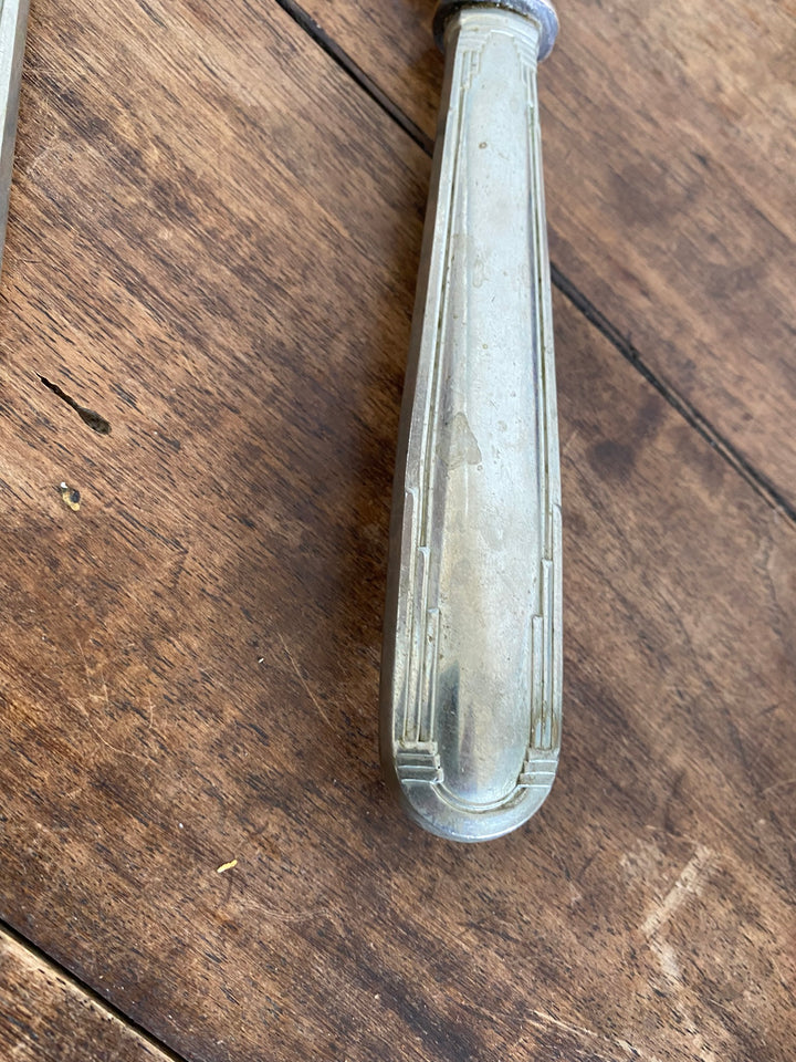 Couteau et fourchette de service en métal argenté