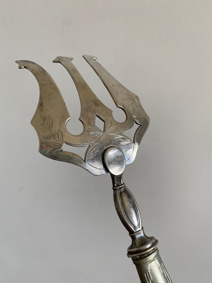 Couteau et fourchette de service en métal argenté