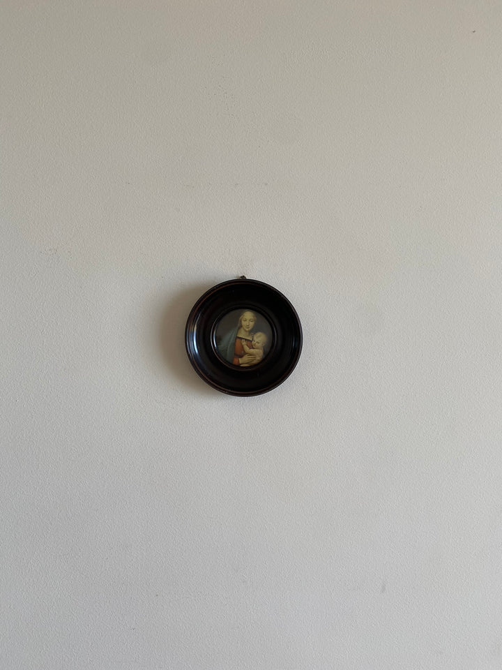 Médaillon rond la vierge et l'enfant cadre couleur ébène en bois