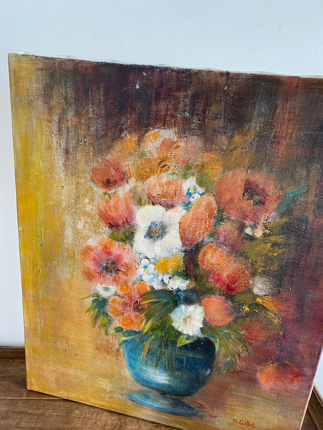 Tableau bouquet de fleurs fond orangé signé M.Caillet