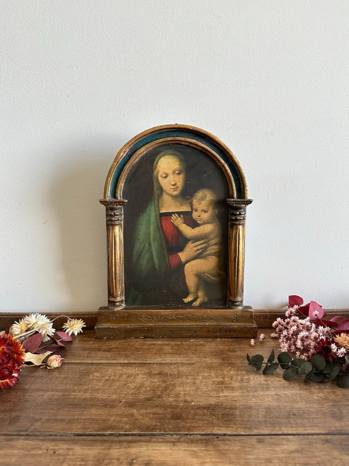 Icône la Vierge et l'enfant sous une arche à colonne dorée et bleue