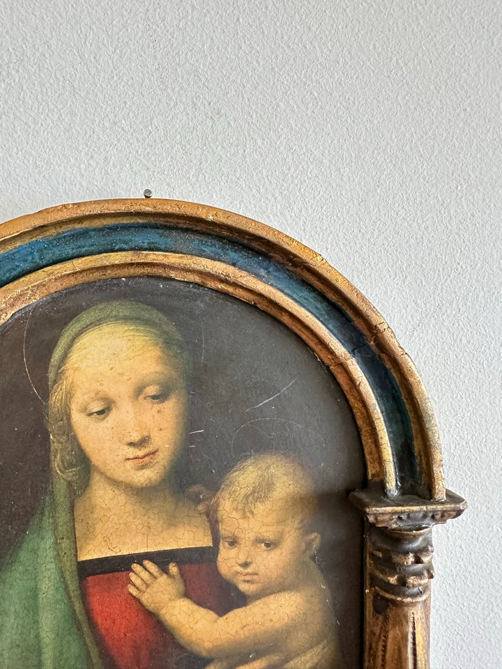 Icône la Vierge et l'enfant sous une arche à colonne dorée et bleue