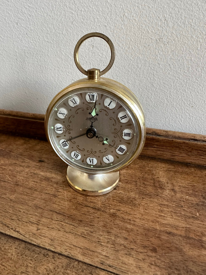Réveil matin rond sur pied avec anse