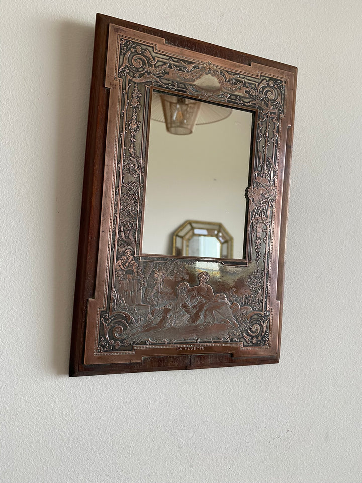 Miroir encadré bois décoré d'une plaque de cuivre