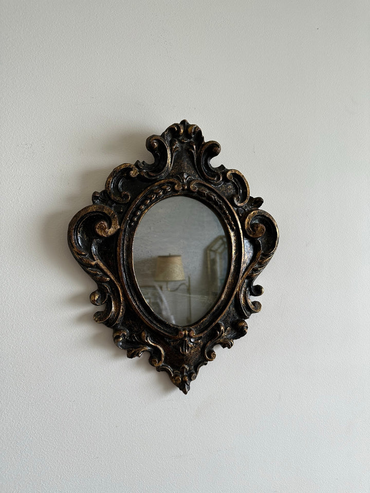 Miroir florentin en bois couleur noir et or
