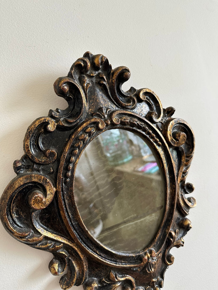 Miroir florentin en bois couleur noir et or