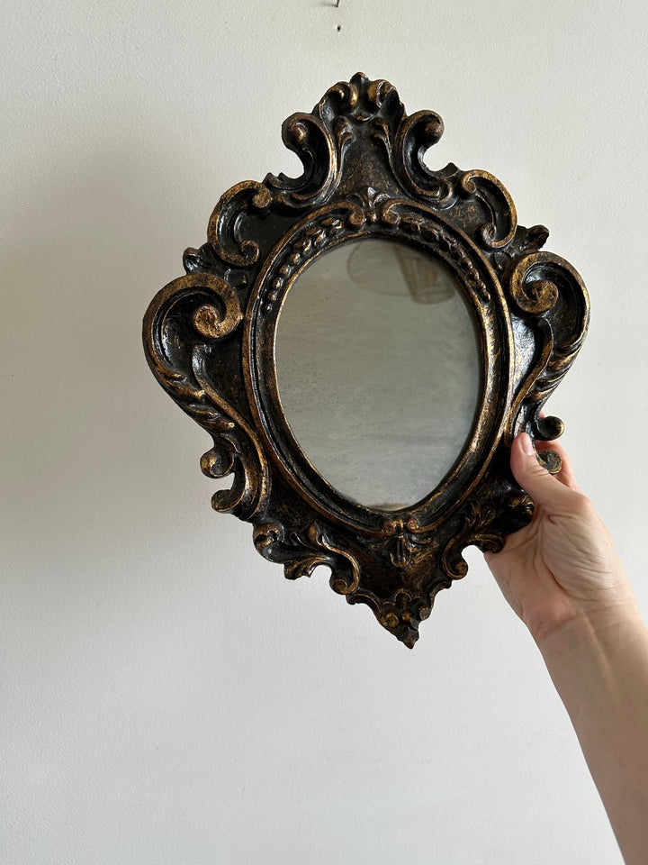Miroir florentin en bois couleur noir et or