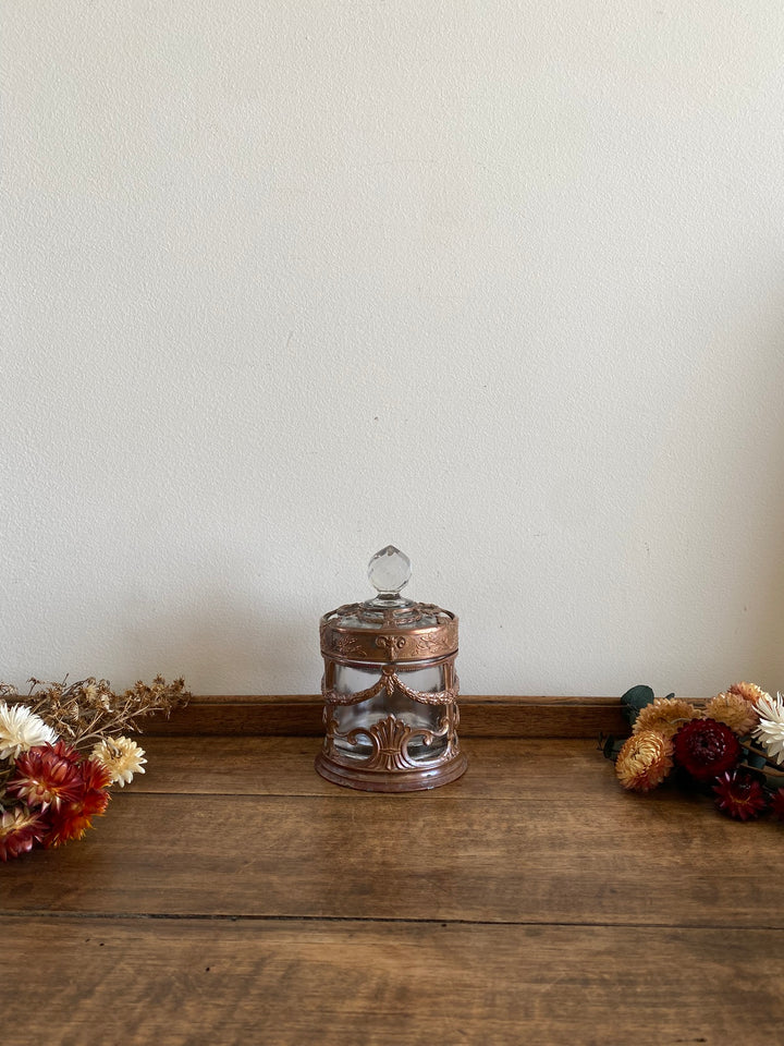 Bonbonnière en verre cerclée de cuivre