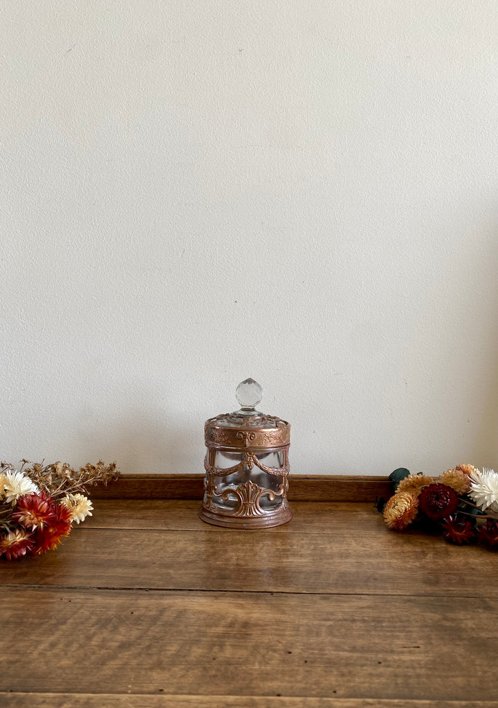 Bonbonnière en verre cerclée de cuivre