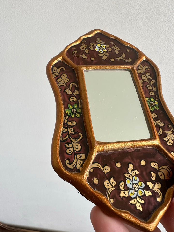 Miroir péruvien émaillé or et marron glacé