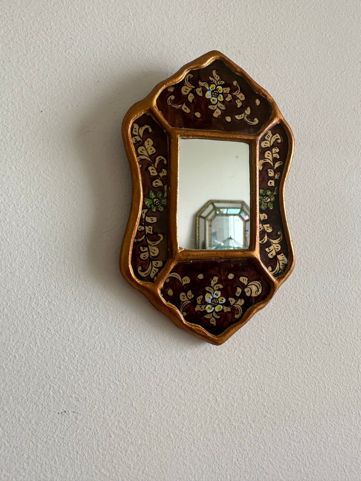 Miroir péruvien émaillé or et marron glacé