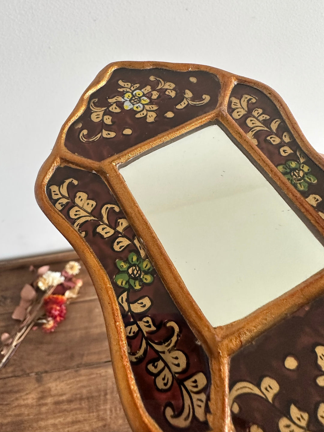 Miroir péruvien émaillé or et marron glacé